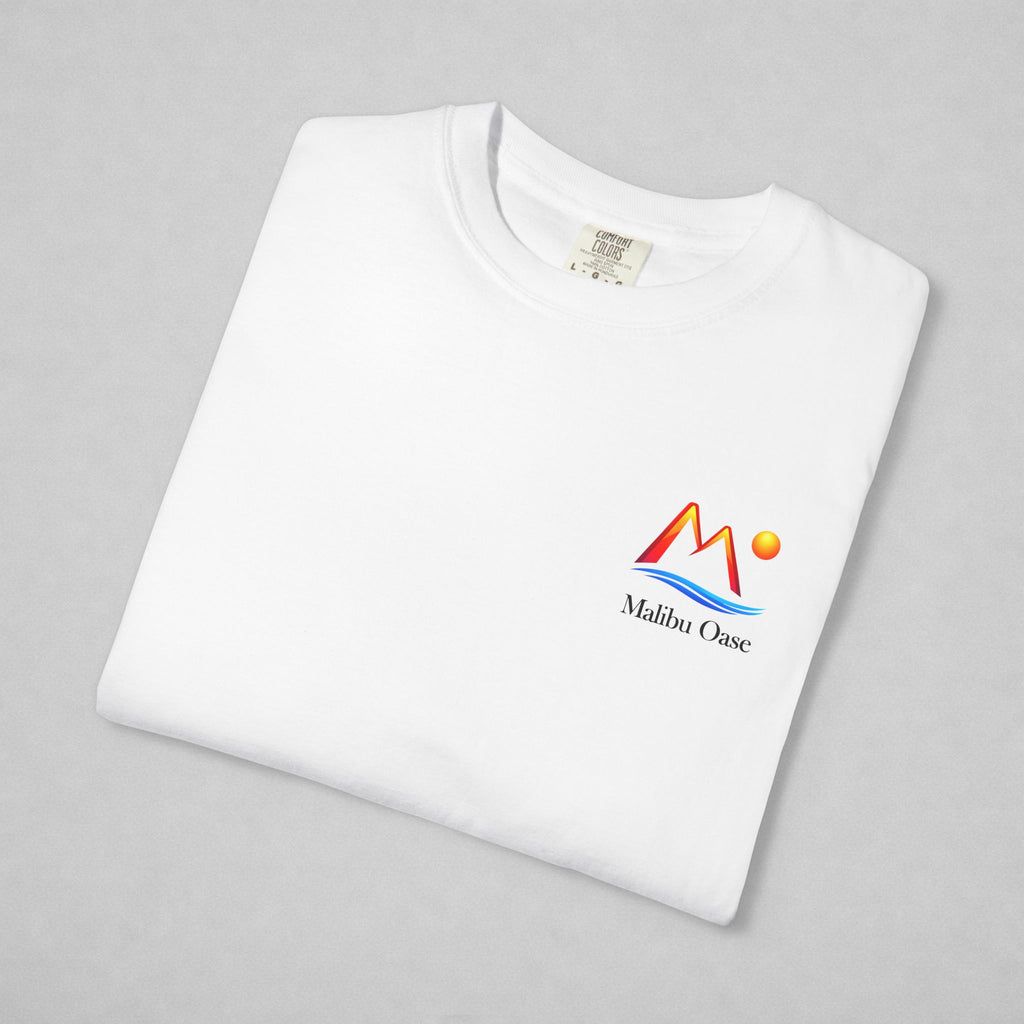 Folded white shirt.  "Malibu Oase" logo.