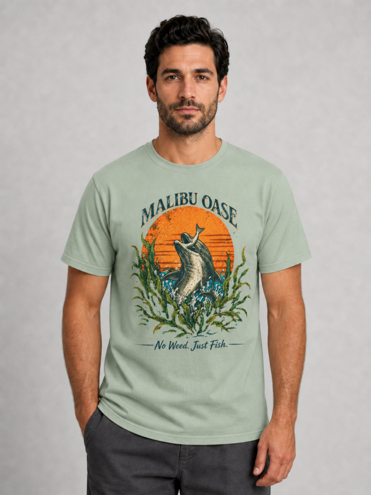 Bay.  Man wearing a shirt with a dolphin grabbing a fish.  Caption: No Weed. Just Fish.