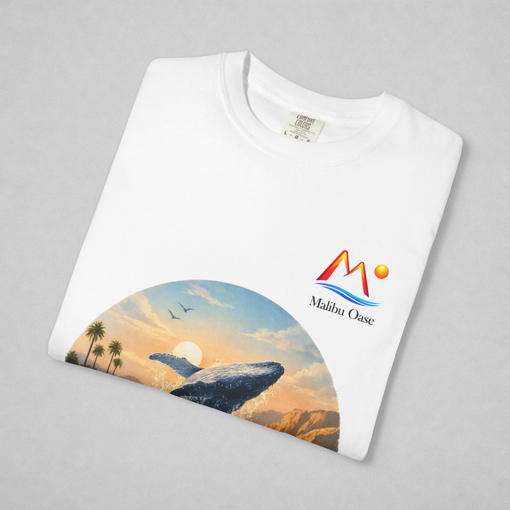 White. Folded shirt with breaching whale and logo.