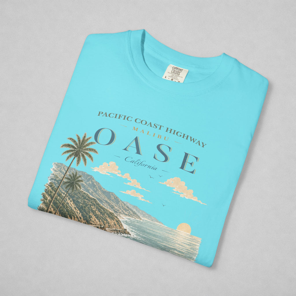 Folded Blue Lagoon T-shirt with text "Malibu OASE"