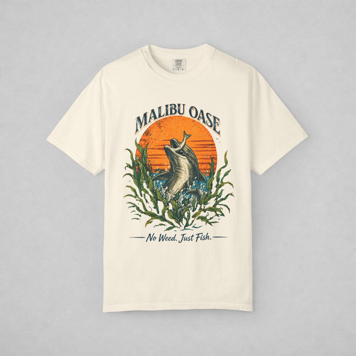 Ivory T-shirt with a dolphin grabbing a fish.  Caption: No Weed. Just Fish.
